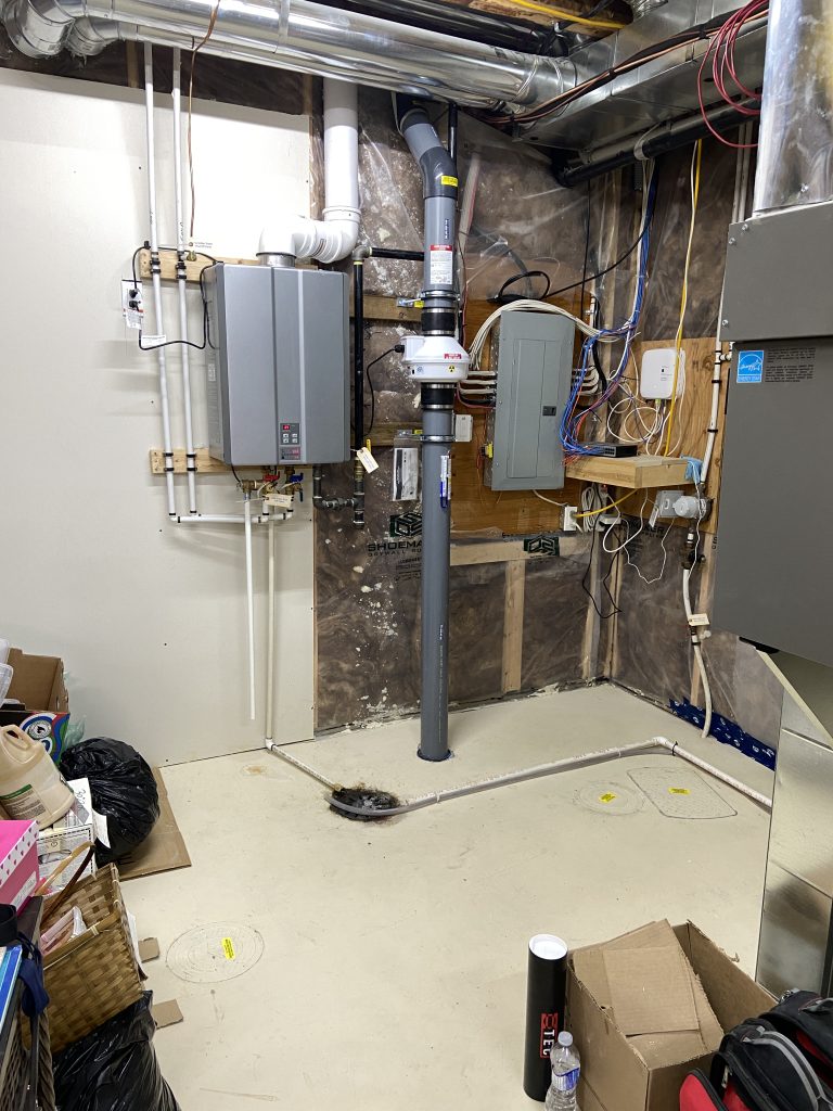 Radon mitigation system installed by Bye Radon in an Airdrie home basement